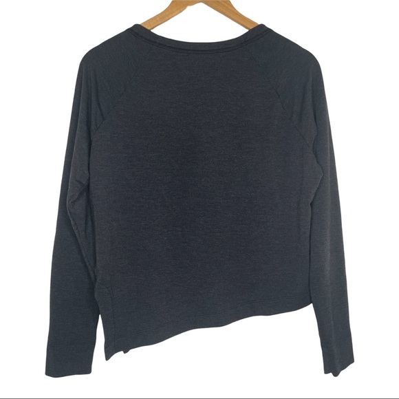 Nike Women's Charcoal Grey, White Swoosh Asymmetrical Hem Long Sleeve T-Shirt - Picture 3 of 6